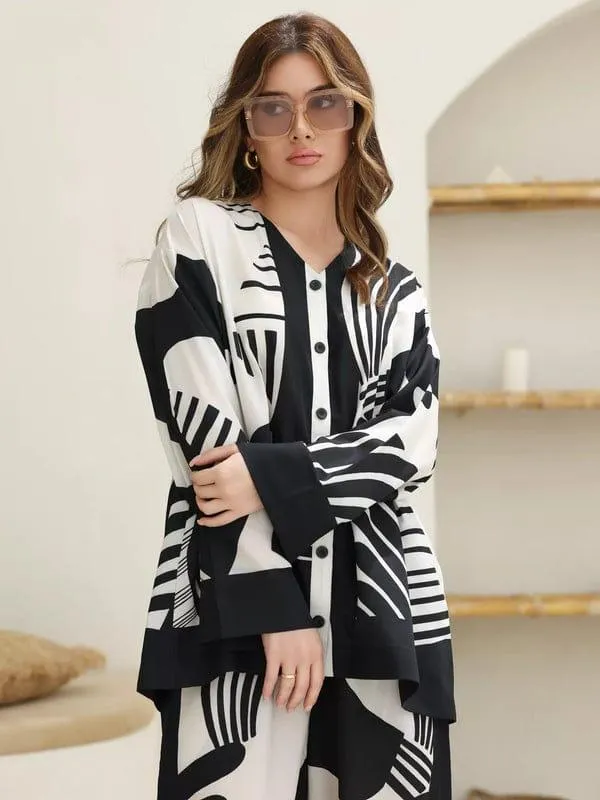 2 Pcs Women's Stitched Khaddar Printed Shirt And Trouser - Image 4